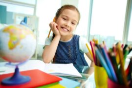 Young Happy Girl at School